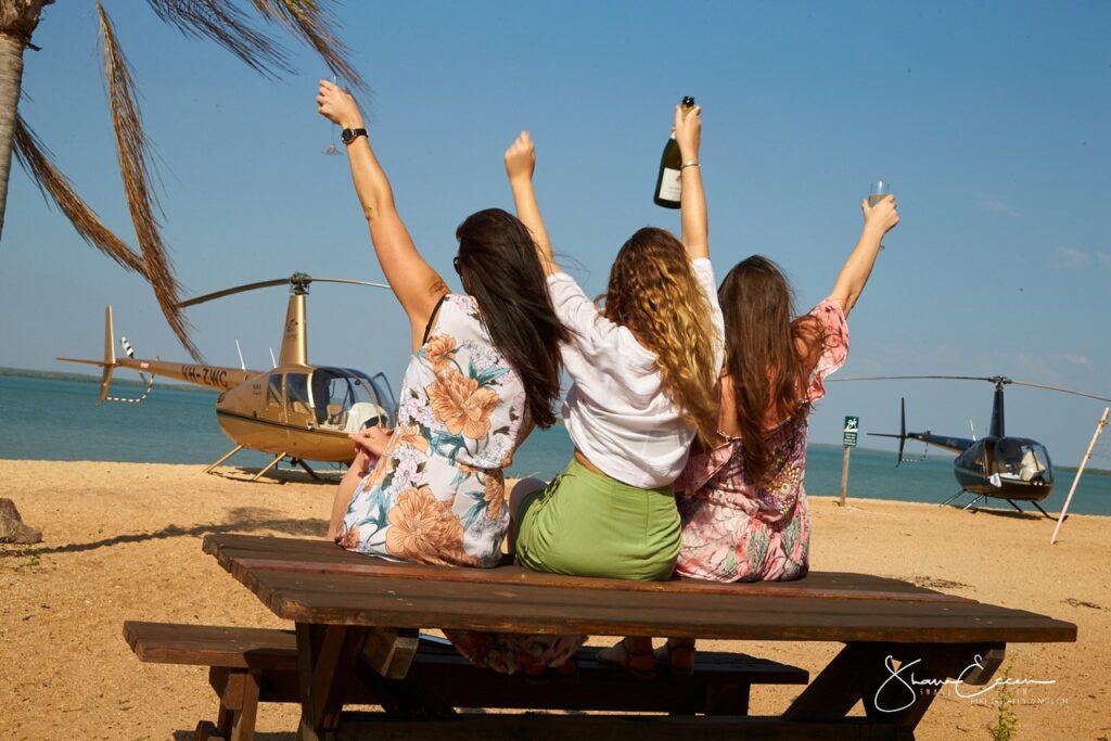 Shane Eecen - Photographer Clicking pictures of a Girls group at Crab Claw Island
