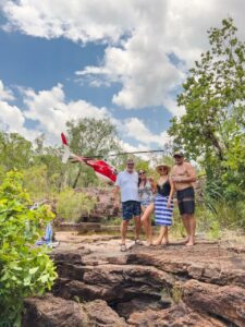 Family enjoying helicopter tour and ready for swimming in Litchfield National Park