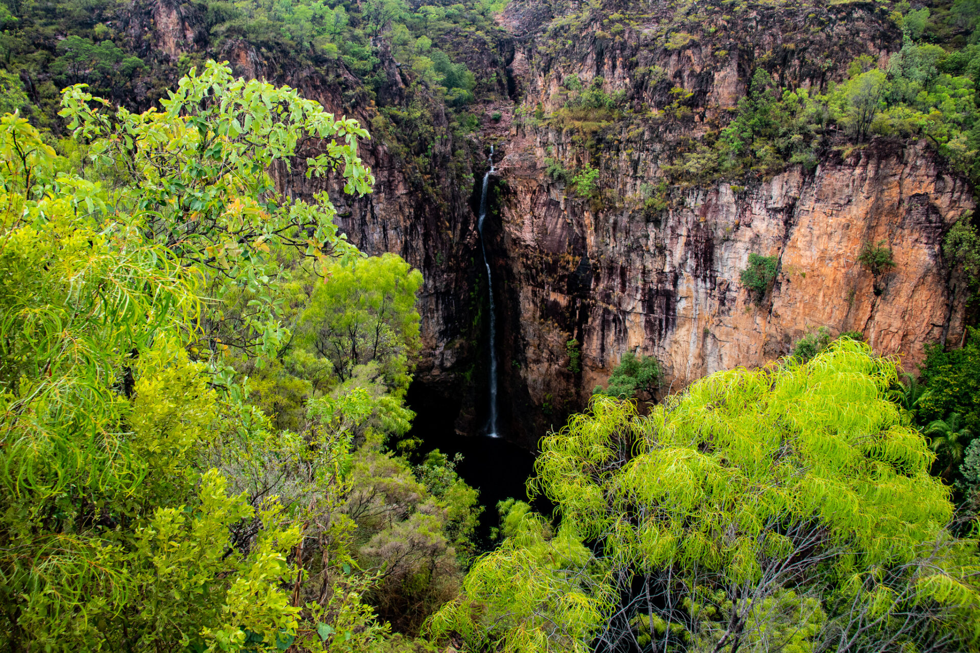 aerial of rocky outcrops and waterfall in Litchfield National Park