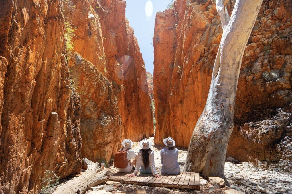 people sitting and admiring Standley Chasm landscapes