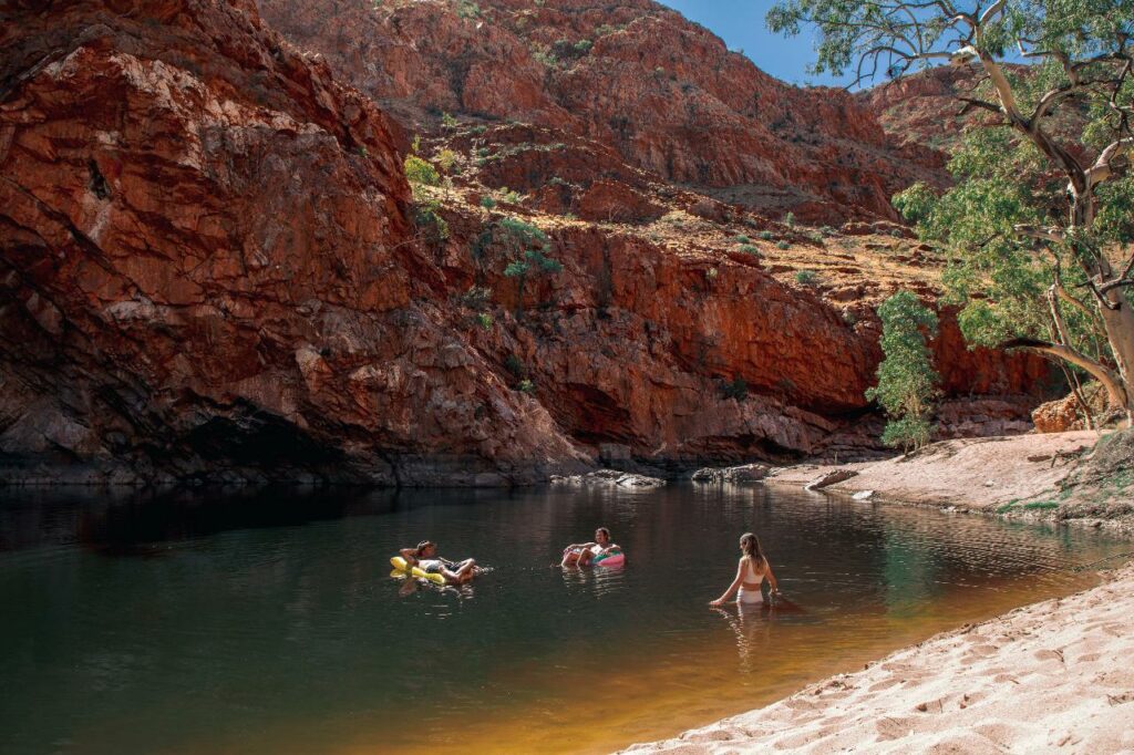 people swimming in Northern Territory landscapes