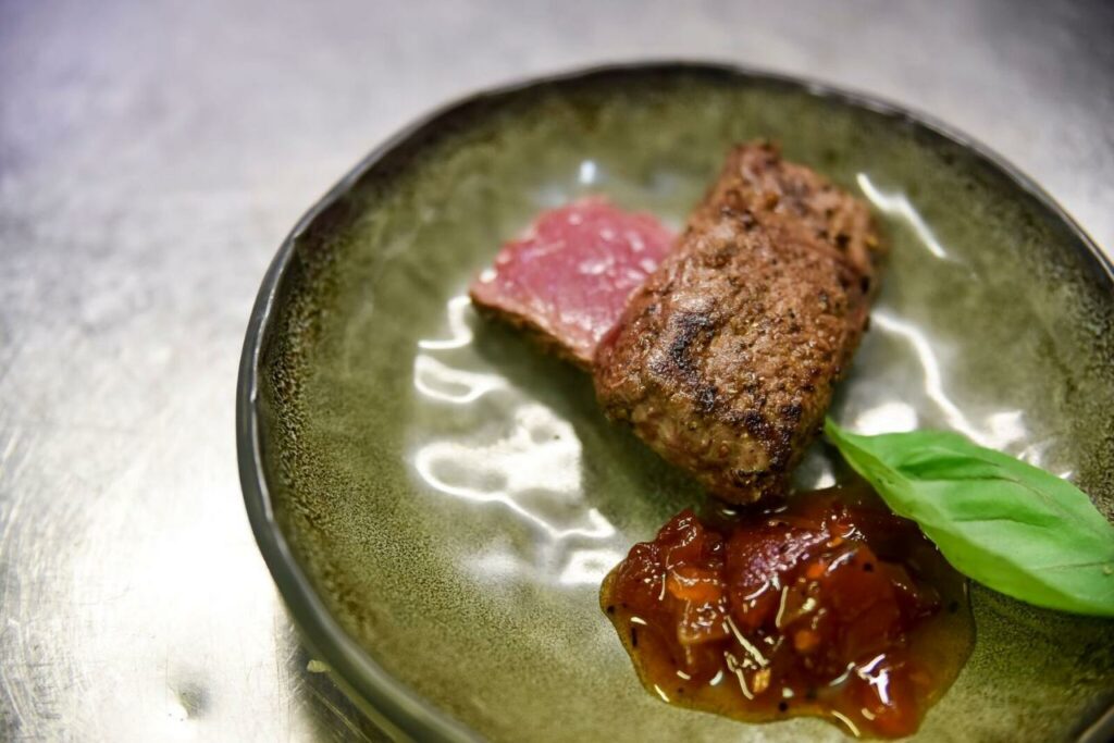 plated food on green plate