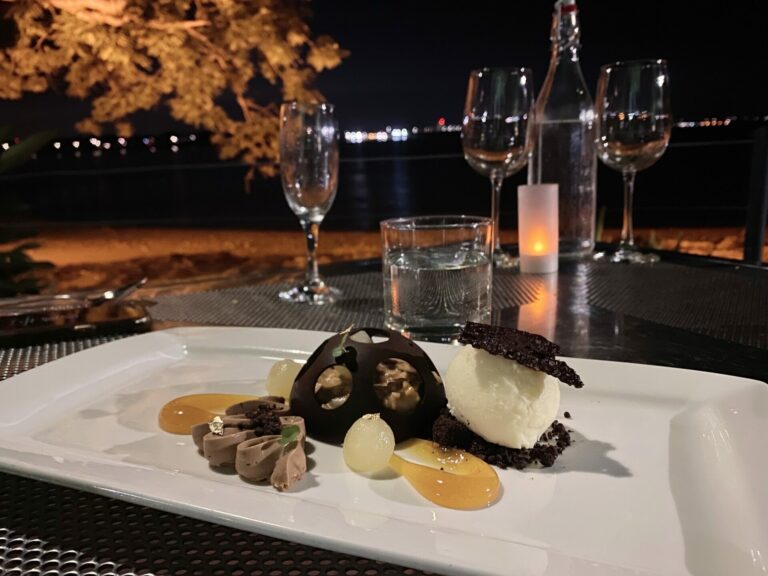 plate of desert with wine glasses in the back at Pee Wee's in Darwin