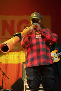 Musician is playing a didgeridoo yidaki Barunga Northern Territory Bagala Aboriginal Corporation unnamed 13 1