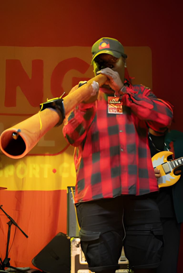 Musician is playing a didgeridoo yidaki Barunga Northern Territory Bagala Aboriginal Corporation unnamed 13 1 upscayl 5x upscayl standard 4x