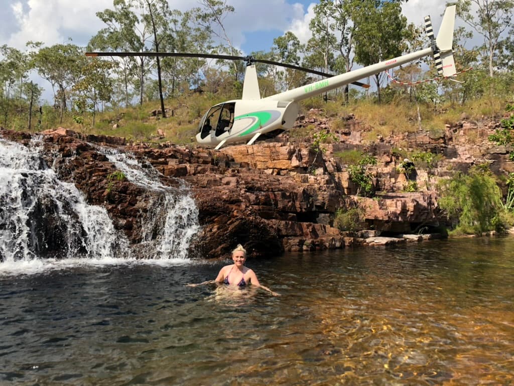 Dany swimming with Helicopter in the background Rock pools Florence Falls in Litchfield National Park @danyekelly
